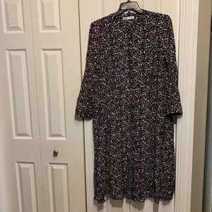 Zara floral print midi dress with pockets . New without tag.